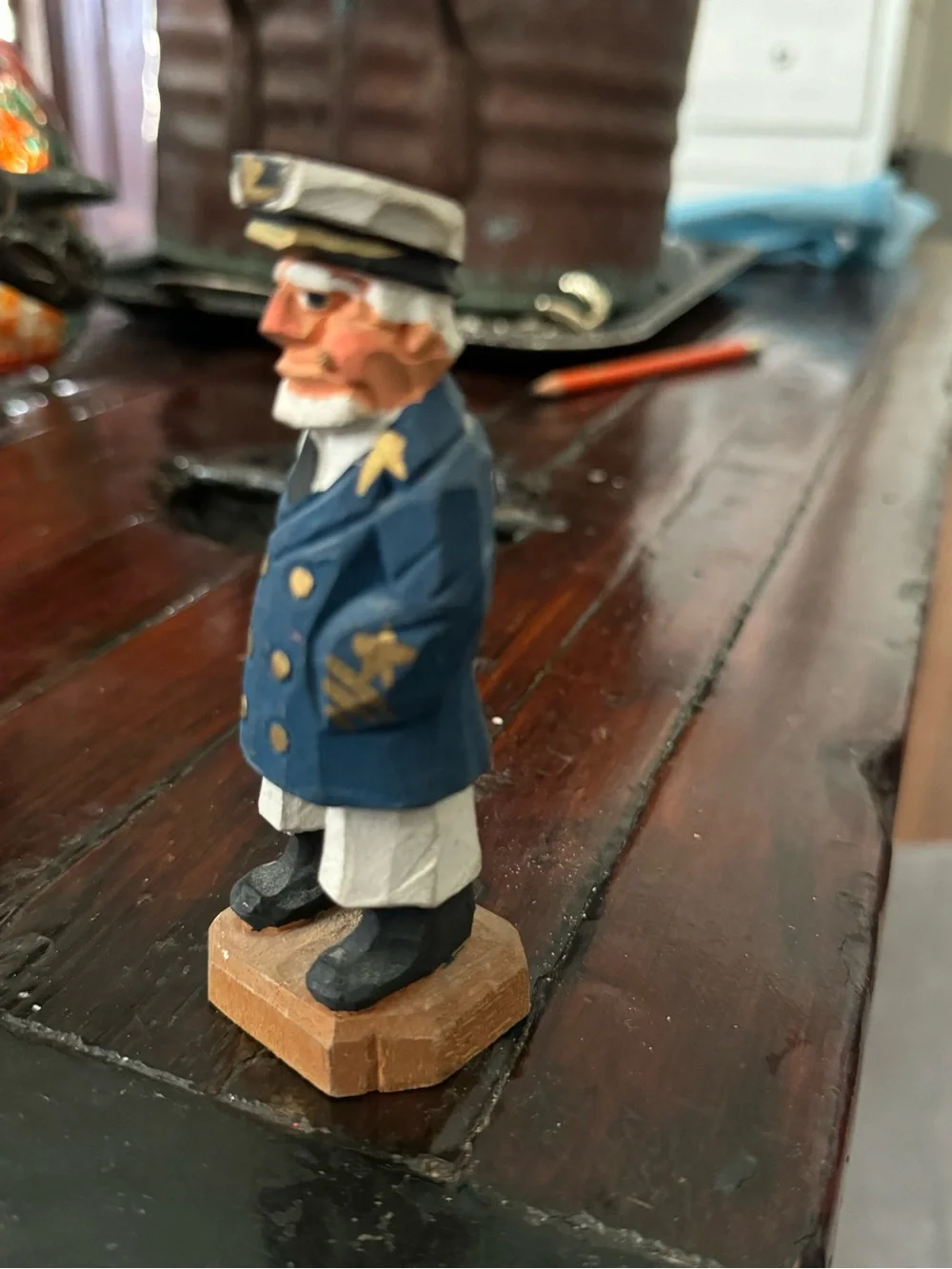 Hand-Carved Captain Figurine in Navy Blue Coat